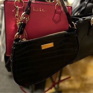 Black and gold Bebe purse